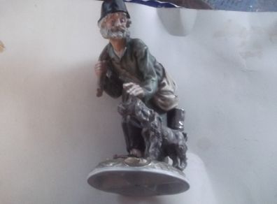 a lovely figurine of the man of the road