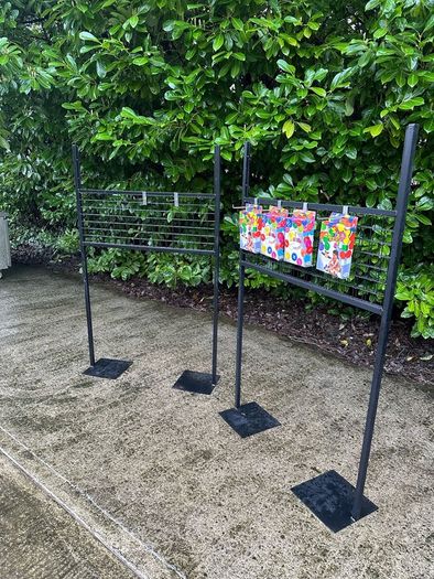 Black Grid Wall Shop Display Stand - Signage Space Above