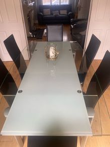 Glass & Chrome Dining Room Table with 6 Black leather and Chrome Chairs