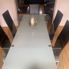 Glass & Chrome Dining Room Table with 6 Black leather and Chrome Chairs