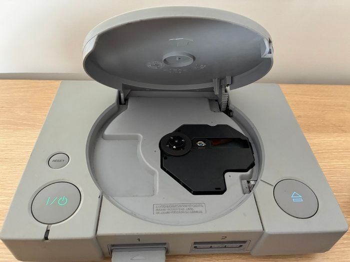 PlayStation console, Dual Shock controller, and all cables