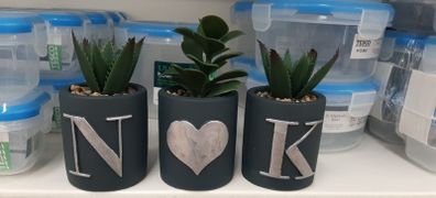 Mini artifical plant in navy pot