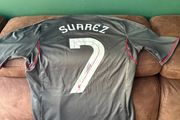 Luis Suarez signed Liverpool away jersey