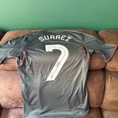 Luis Suarez signed Liverpool away jersey