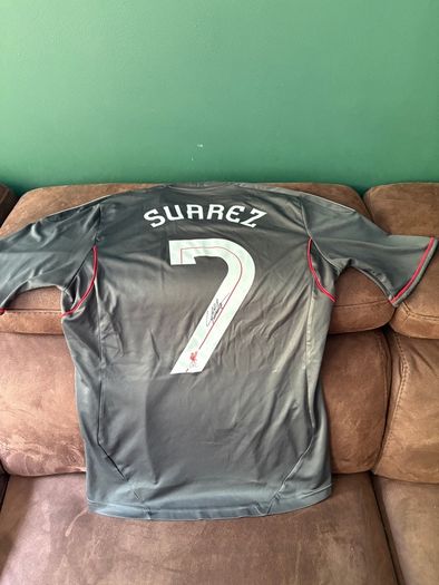 Luis Suarez signed Liverpool away jersey