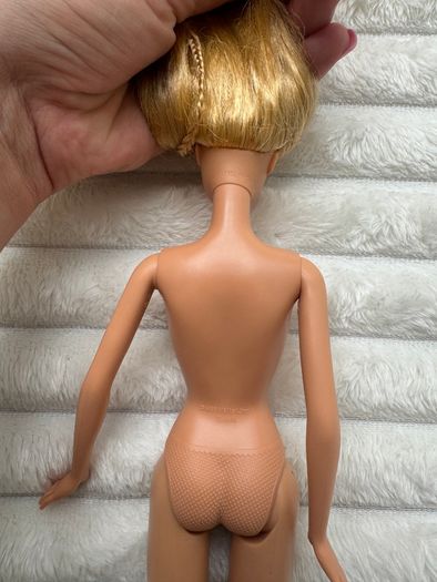 Belly Button Barbie 1999 Blonde With 2 braids Used Damaged hand Please look at the pictures
