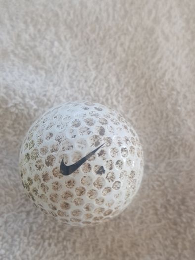 golf ball and tees