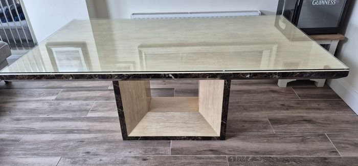 marble dinning table with glass top.