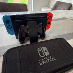Nintendo Switch console + case