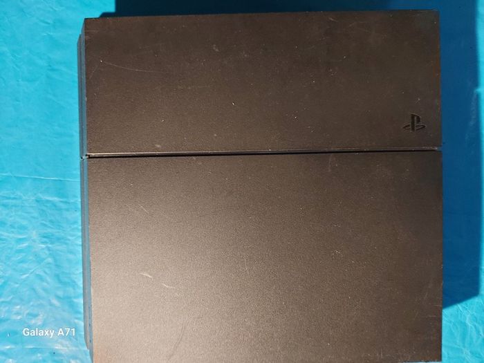 Playstation 4, Model CUH-1216A. Powers on and Off, comes with power cable only,