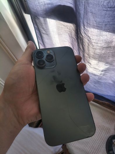 Apple iPhone for sale with a damaged screen