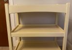 cream wooden baby changing table