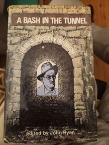A Bash In The Tunnel. Edited By John Ryan. First Edition Hardback With Dustjacket In Good Condition.