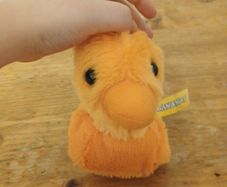 cute  purple and orange plush duck