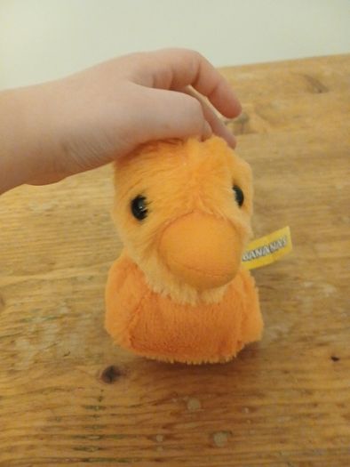 cute  purple and orange plush duck