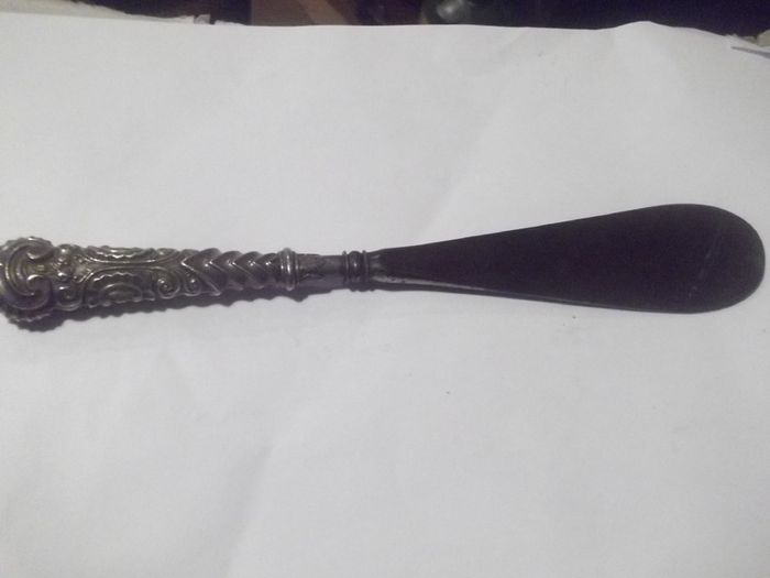 a antique silver handle and steel shue horn