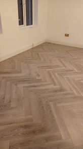 Herringbone laminated flooring