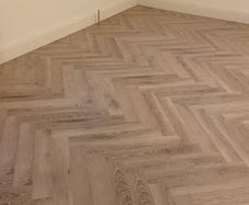 Herringbone laminated flooring