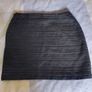 H&M black woven mini skirt . Image 3