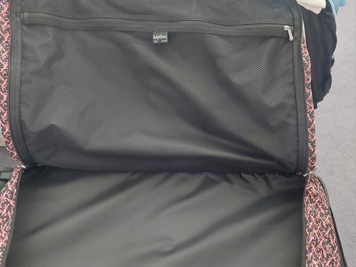 large wheeled  Kipling suitcase