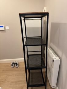 Rustic shelving unit, black metal and a wooden top. Beautiful and functional. Perfect conditions.