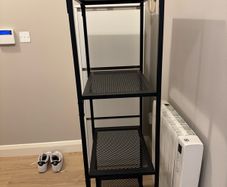 Rustic shelving unit, black metal and a wooden top. Beautiful and functional. Perfect conditions.