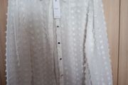 Ladies ivory pom pom shirt