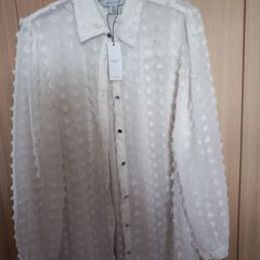 Ladies ivory pom pom shirt