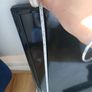 Walker brand flat screen tv 29inch in length  x17 inch heigth. Comes with original remot control, swivel mounted tv bracket and cables. . Image 4
