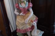 Country Girl With Duck
