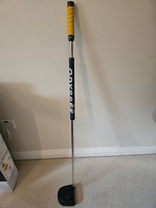Odyssey broomstick putter.