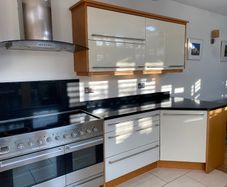 Modern Cream Gloss & Solid Black Granite Kitchen (Includes Electric Range)  North Wicklow