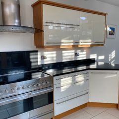 Modern Cream Gloss & Solid Black Granite Kitchen (Includes Electric Range)  North Wicklow