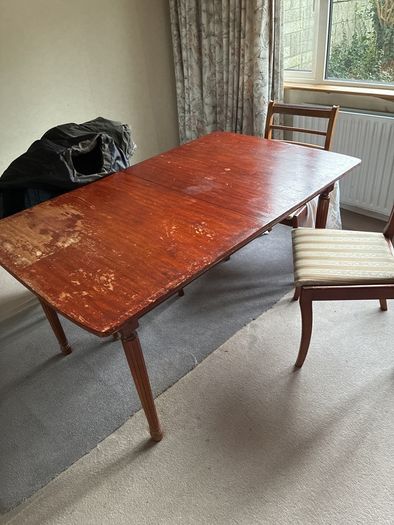 mahogany dining table and 3 chairs