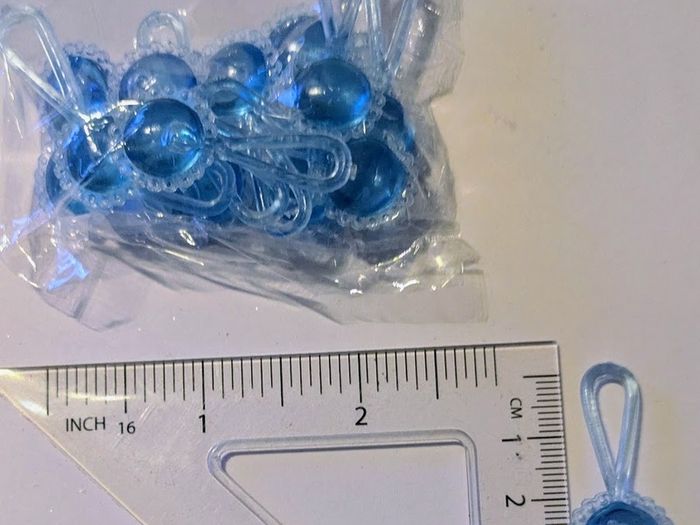 Blue plastic baby shower pacifier charms - pack of 12