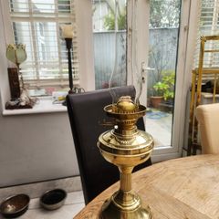 Brass duplex oil lamp . working and polished.