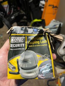 Jockey wheel cover and hitch lock