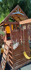 Garden playhouse slide swing