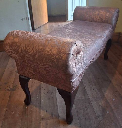 very old small type sofa