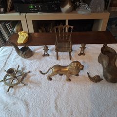 8 brass figures.