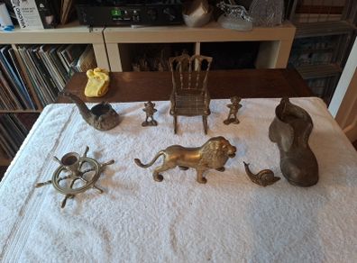 8 brass figures.