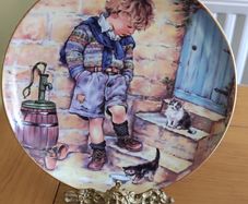Leonard Collection Decorative Plate: "In Trouble Again" by Christine Haworth