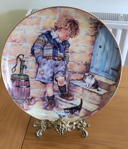 Leonard Collection Decorative Plate: "In Trouble Again" by Christine Haworth