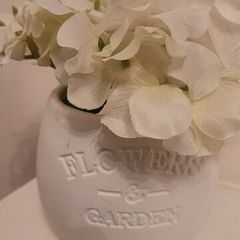 Faux Flowers In Ceramic Pot