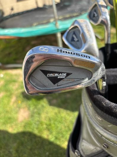 Stalemate golf bag with clubs inside