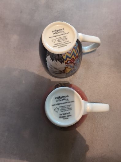 Two designer red Indian cups