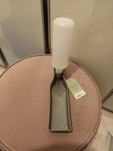 Clip on doggy water bottle and drinking tray