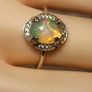 Ethiopian Welo Opal and Lab Grown Diamond Oval Cluster Ring. Image 5