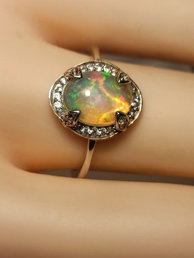 Ethiopian Welo Opal and Lab Grown Diamond Oval Cluster Ring.