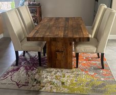Solid reclaimed wood dining table w/ thick wood plank top. Quality construction. Seats 4-6. Natural patina. Imported from the US.